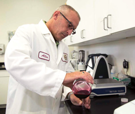 Lab worker in a cranberry plant